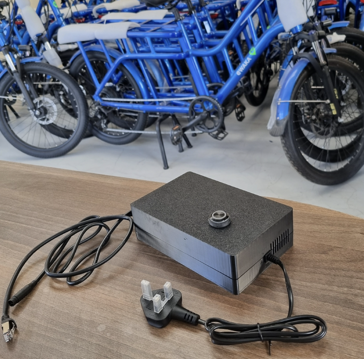 Development of a Pay-As-You-Go Battery-Charging System for Electric Mobility in Nairobi, Kenya
